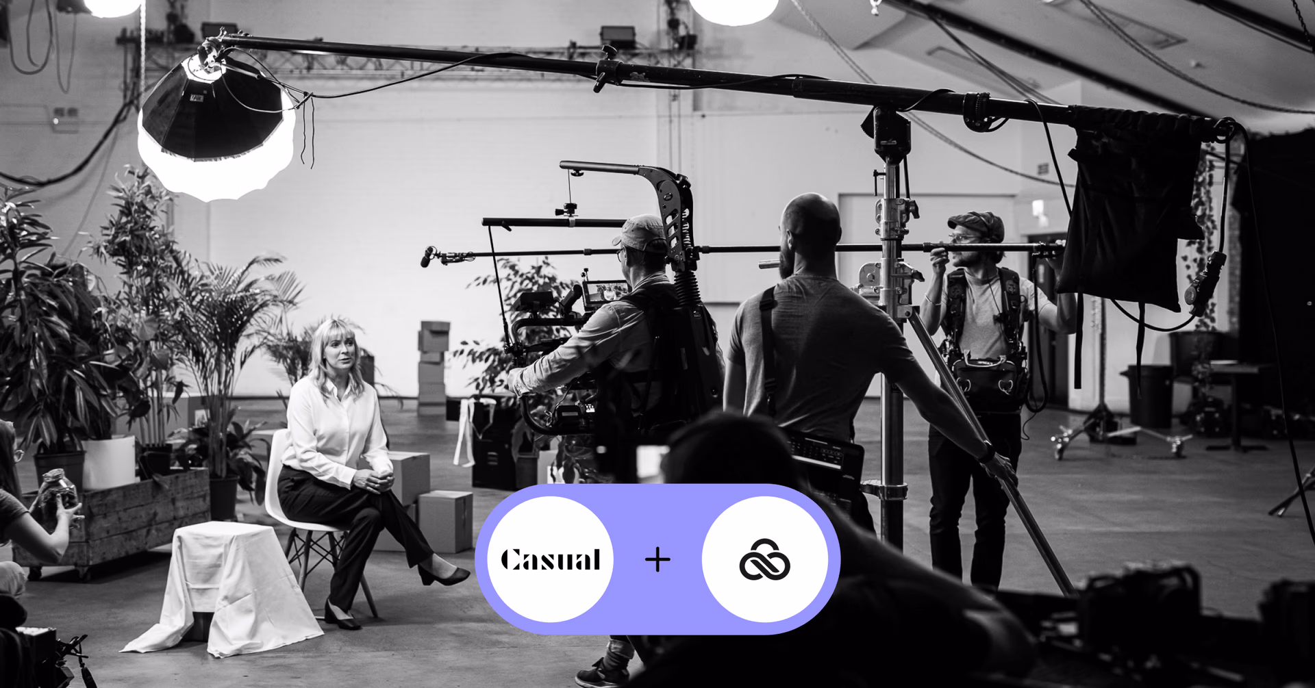 A video production crew filming an interview on a large studio set, with a purple overlay graphic showing the Casual and LucidLink logos.