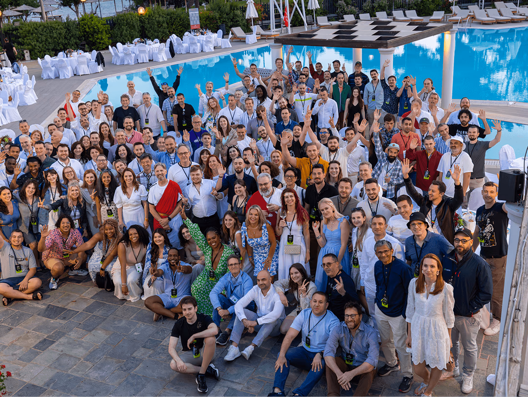 LucidLink team in front of a pool in Greece. 