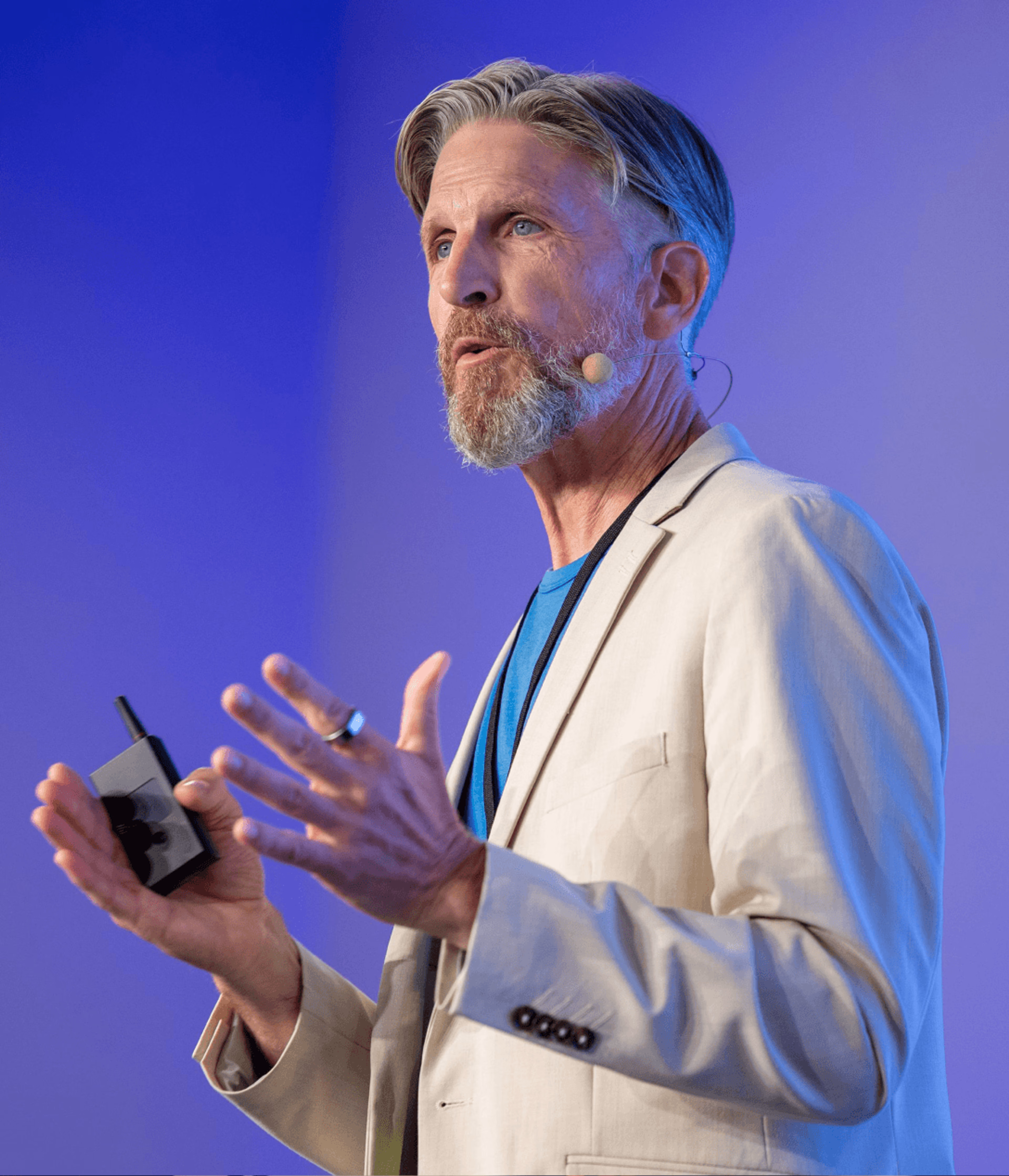 Peter Thompson (CEO of LucidLink) speaking on a stage. 