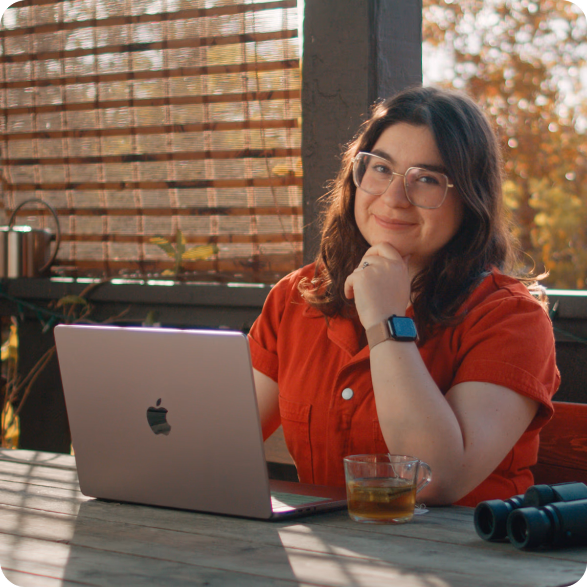 A creative professional working on a laptop remotely through LucidLink.